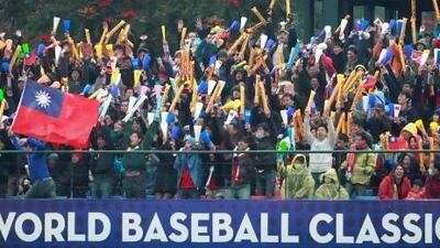 Fans cheer on Taiwan before their game against the Netherlands last week.