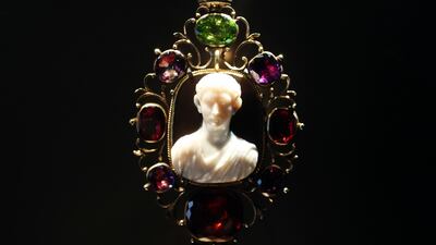 A Roman cameo, possibly depicting Agrippa Postumus, is on display at Louvre Abu Dhabi. Chris Whiteoak / The National