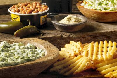 Sides include salads, barbecue beans and creamed spinach