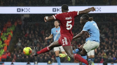 Man of the match Jeremy Doku scores Manchester City's third goal. EPA
