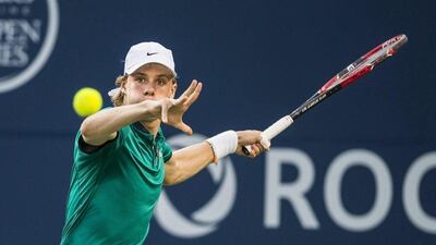 Denis Shapovalov, of Canada, returns to Nick Kyrgios, of Australia, during men’s first round Toronto Masters tennis action in Toronto on Monday, July 25, 2016. Aaron Vincent Elkaim / The Canadian Press / AP