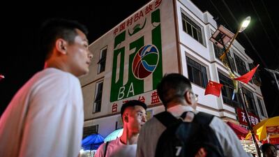 A mural of the CunBA on a building facade in Taipan village