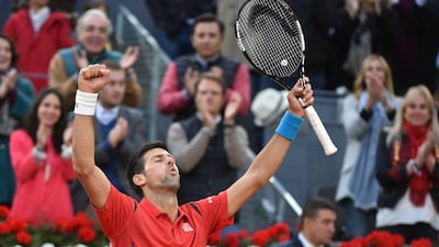 Serbia’s Novak Djokovic celebrates beating Britian’s Andy Murray during the Madrid Masters men’s tennis final at the Caja Magica (Magic Box) sports complex in Madrid on May 8, 2016. Gerard Julien / AFP