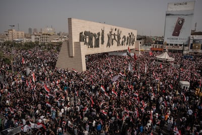 Followers of Iraqi Shiite cleric Moqtada Al Sadr gather in Tahrir Square, Baghdad, to protest against the US and Israel. Getty Images