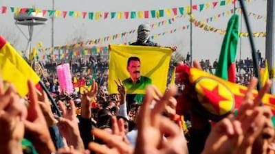 Kurds celebrate Nowruz, the Persian New Year festival, and flash victory signs in the southern Turkish city of Diyarbakir yesterday.