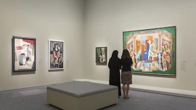 Visitors at the 'Rendezvous in Paris' exhibition, on view at the Louvre Abu Dhabi until Saturday, December 7. Ismail Noor
