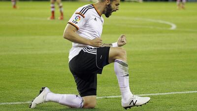 Valencia's Alvaro Negredo celebrates his goal during their La Liga win over Granada on Monday night. Jose Jordan / AFP / April 27, 2015