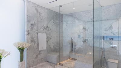 Italian marble in the spacious bathroom. Courtesy Luxhabitat Sotheby's International Realty