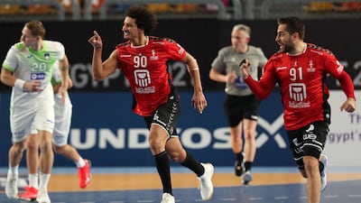 Egypt's left back Ali Mohamed Zein, centre, and right winger Mohammad Sanad. AFP