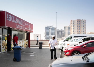 Abdulla Omar Cafeteria serves a variety of sandwiches with Chips Oman. Reem Mohammed / The National