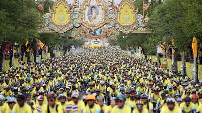 Participants are seen ahead of the 'Bike Un Ai Rak or Bike Love and Warmth' mass cycling event in Bangkok, Thailand. Reuters