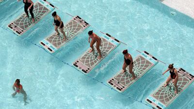 The 40-minute HIIT programme begins with a warm up, stretches and yoga moves. Classes are led by highly trained instructors at the Intercontinental Dubai Marina and at Westin Abu Dhabi Golf Resort & Spa, and it is recommended that participants are good swimmers. Chris Whiteoak / The National