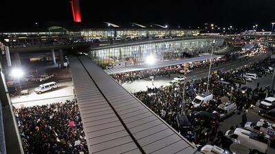People gather for a protest at Terminal 4 of the John F. Kennedy (JFK) International Airport after people arriving from Muslim countries were held at the border control as a result of the new immigration policies enacted by US President Donald Trump in New Yor. Justin Lane / EPA