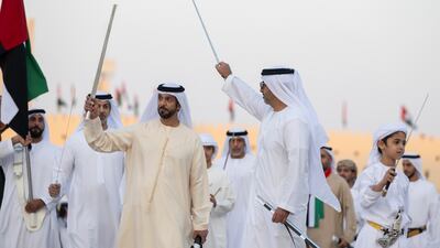 Sheikh Saif, Sheikh Khalifa bin Mohamed Al Nahyan, UAE ambassador to Jordan, and other Sheikhs take part in a traditional dance. Abdulla Al Neyadi / Presidential Court