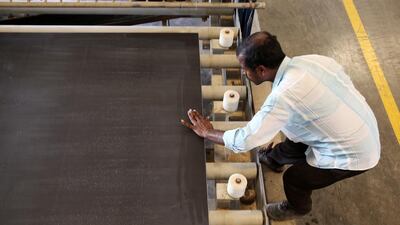 RAK Ceramics has used key resources such as clays and raw materials sourced in and around Ras Al Khaimah, in combination with substantial investments in machinery and technology, to become one of the biggest ceramics manufacturing firms in the world. Pawan Singh / The National