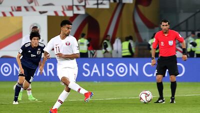 Akram Afif scores Qatar's third goal in their win over Japan from the penalty spot. AFP