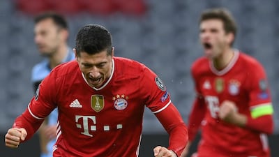 Bayern Munich's remarkable Polish forward Robert Lewandowski scoring the opening goal from the penalty spot against Lazio as Bayern qualified for the quarter-finals of the Champions League for the 19th time - the most of any team in the competition's history. AFP
