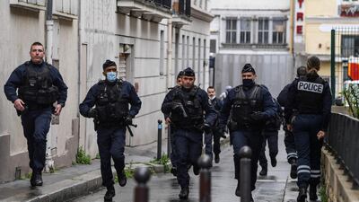 French police arrive at the site of the attack. AFP