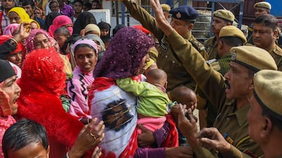 A woman confronts police during a protest in Morigaon, Assam, against the arrest of people allegedly involved in child marriages. AFP