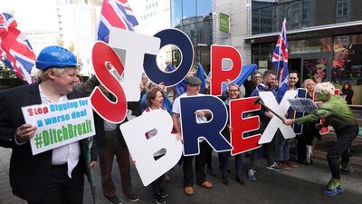 Britain's Prime Minister Boris Johnson's look-alike attends a "Stop Brexit" protest. Reuters