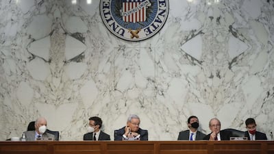 Mr Cardin, foreign relations committee chairman Mr Menendez and ranking member Senator James Risch on Capitol Hill in August 2021 for a hearing on repealing authorisation for military activity in Iraq. Getty / AFP
