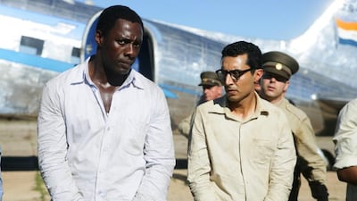 Idris Elba, left, stars as Nelson Mandela in the film ‘Mandela: Long Walk to Freedom’ which had a gala screening in the Dubai International Film Festival on Monday, the same day that South Africa held a memorial service for its former president Nelson Mandela. AP Photo