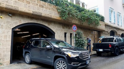 A woman believed to be Carole Ghosn, wife of former Nissan chairman Carlos Ghosn, leaves the family's residence in Beirut, Lebanon, by car. Reuters