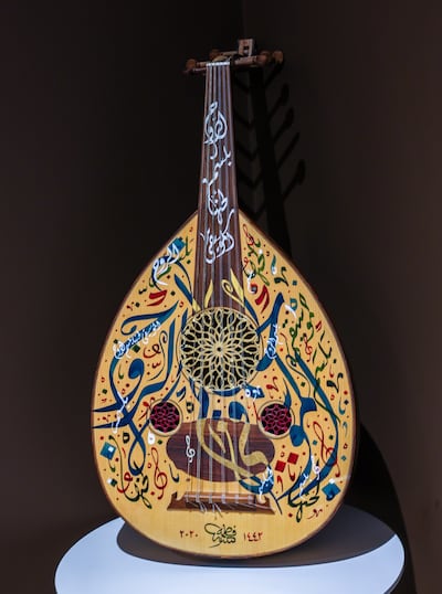 An oud featuring the calligraphy of the late Fatma Saeed AlBagali, a renowned calligrapher who was regularly involved with Khawla Art and Culture. Victor Besa / The National