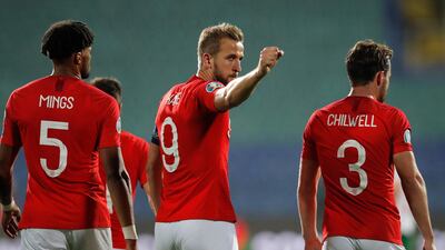 Harry Kane, center, celebrates after scoring his side's sixth goal during the Euro 2020 Group A qualifying match against Bulgaria. AP
