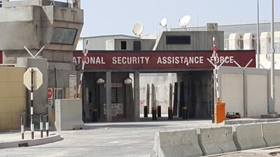 The Abu Dhabi set for War Machine, showing a watchtower and building with the sign ‘National Security Assistance Force’. The National staff