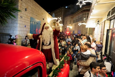 Christmas parade in Bethlehem, home to the famed Church of the Nativity. Reuters