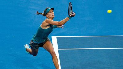 Eugenie Bouchard of Canada plays a forehand to Serena Williams of the US during her women's singles win in the Hopman Cup on Tuesday in Perth, Australia. Will Russell / Getty Images / January 6, 2015