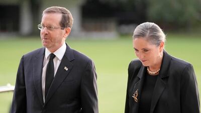 Israel's President Isaac Herzog and his wife Michal arrive at Buckingham Palace. AFP