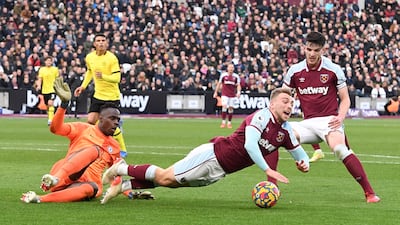 West Ham's Jarrod Bowen is fouled by Chelsea goalkeeper Edouard Mendy and wins a penalty. EPA