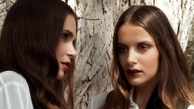 (On left): Vest, BNQ at IF Boutique. White striped shirt, Sass and Bide at Bloomingdale's. (On right): Vest, BNQ at IF Boutique. Ruffled shirt, Alexis at Bloomingdale's.