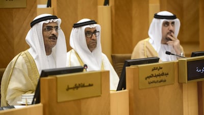 Dr. Abdullah Bin Mohammed Belhaif Al Nuaimi, UAE Minister of Infrastructure, deals with issues at the Federal National Council on Wednesday. Khushnum Bhandari / The National
