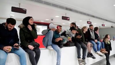 Lebanese protesters occupy a branch of BLC Bank in Beirut on Saturday. AFP