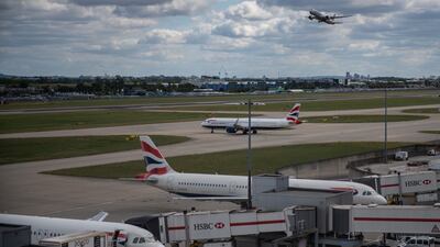 British Airways is among the airlines urged by British authorities to take steps to avoid more flight cancellations. Bloomberg