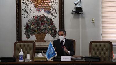 Director General of the International Atomic Energy Agency Rafael Mariano Grossi seen speaking in a meeting with Iran's atomic chief Ali Akbar Salehi in Tehran, Iran, February 21, 2021. Atomic Energy Organisation of Iran via AP