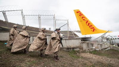 Pegasus Airlines aircraft skidded off the Sabiha Goekcen airport runway in Istanbul, killing three people and injuring 157 others. EPA/TOLGA BOZOGLU
