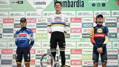 Second-placed Soudal Quick-Step rider Remco Evenepoel, winner Tadej Pogacar and third-placed Lidl-Trek rider Giulio Ciccone celebate on the podium. AFP