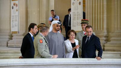 Sheikh Mohamed with Sheikh Hazza bin Zayed, vice chairman of the Abu Dhabi Executive Council, and Mr Le Cornu at the military museum. Photo: Presidential Court
