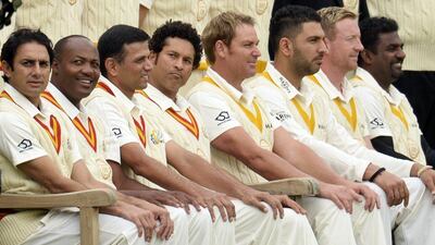 MCC captain Sachin Tendulkar, fourth left, and Rest of the World XI captain Shane Warne, to his right, line up with teammates before the Lord's Bicentenary match on Saturday. Philip Brown / Reuters