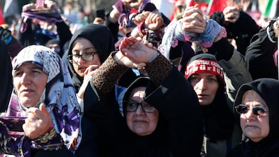Hundreds of demonstrators, some of them with hands bound symbolising captivity, called for the release of the women and children during the event which coincided with International Women's Day. AP