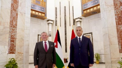 Iraqi Prime Minister Mustafa Al-Kadhimi receives King Abdullah II of Jordan in Baghdad. Iraqi Prime Minister Media Office/Handout via REUTERS