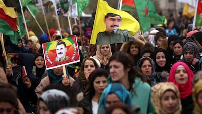 Syrian Kurds marching in Afrin, northern Syria, march in support of jailed PKK leader Abdullah Ocalan. AFP