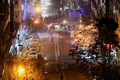 Iranian demonstrators in a street in Tehran. Reuters