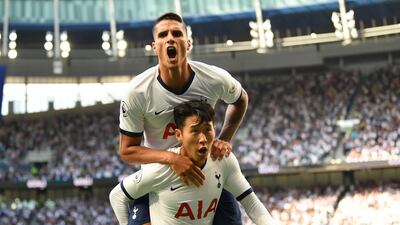 Son Heung-min (bottom) celebrates with teammate Erik Lamela after scoring Tottenham's first goal in a 4-0 victory over Crystal Palace at the Tottenham Hotspur Stadium. AFP