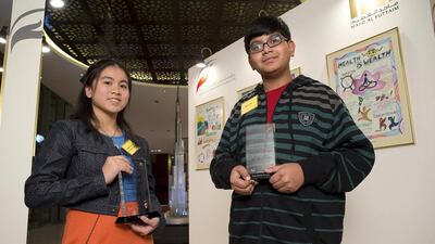 Finalists of the Majid Al Futtaim Charity Foundation National School Posters Competition on “Healty Lifstyle”. Andrea Ella Mascunana from The Philippine School Dubai (left) won first place in the hand-drawn category while Reebhu Pal from Delhi Private School in Dubai (right) was a runner up. Antonie Robertson/The National