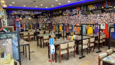 Al Ustad Special Kabab has screens and hand sanitiser stations. Courtesy Al Ustad Special Kabab